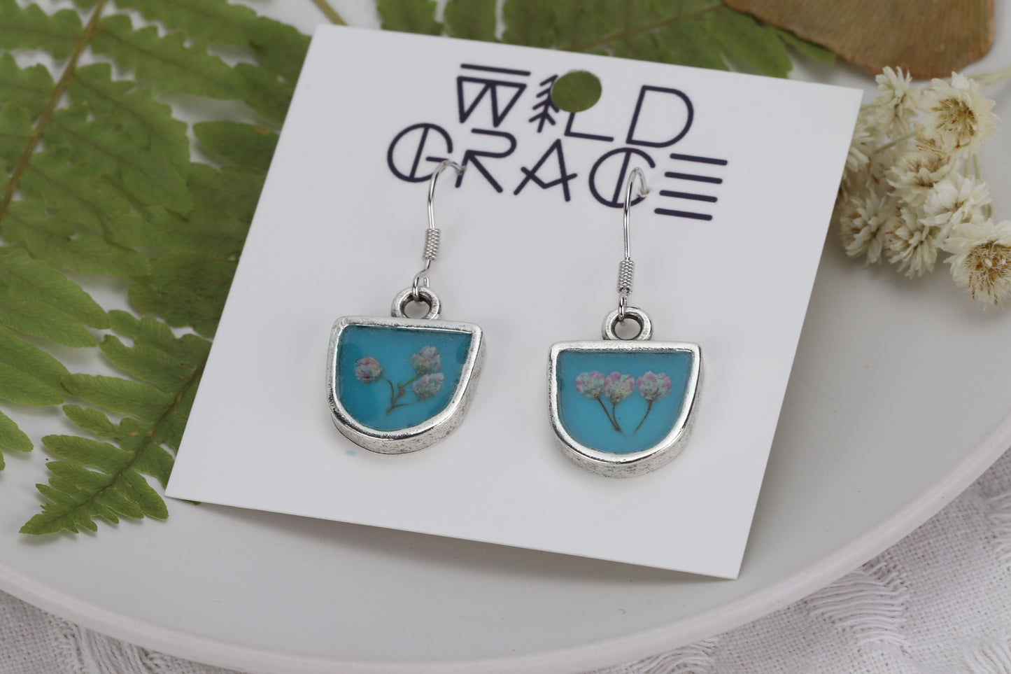 Aqua blue and rice flower earrings