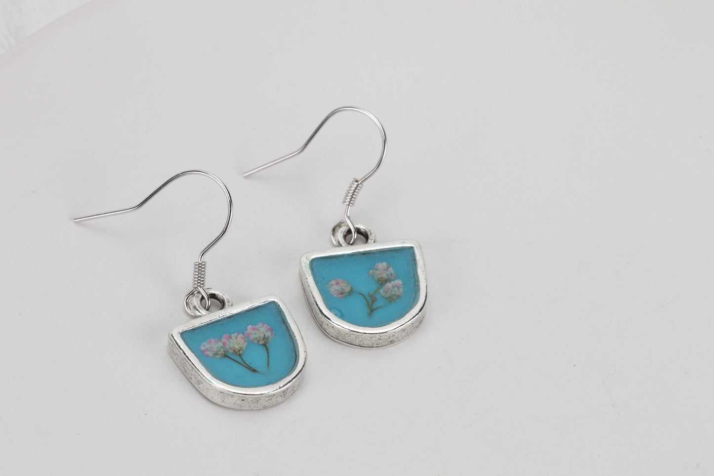 Aqua blue and rice flower earrings