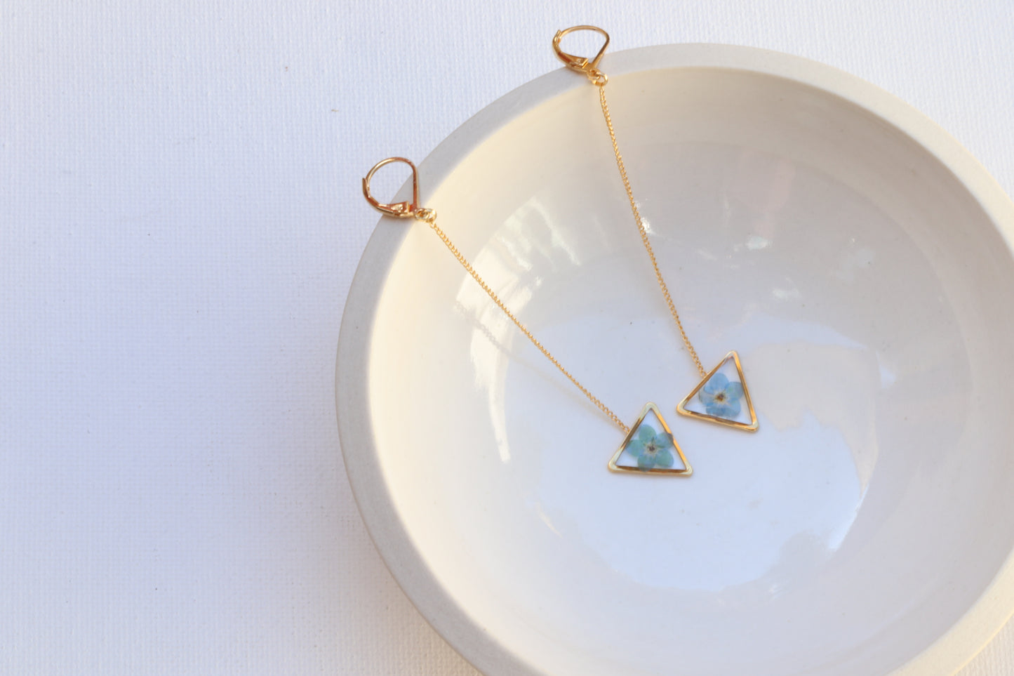 forget me not long drop triangle earrings