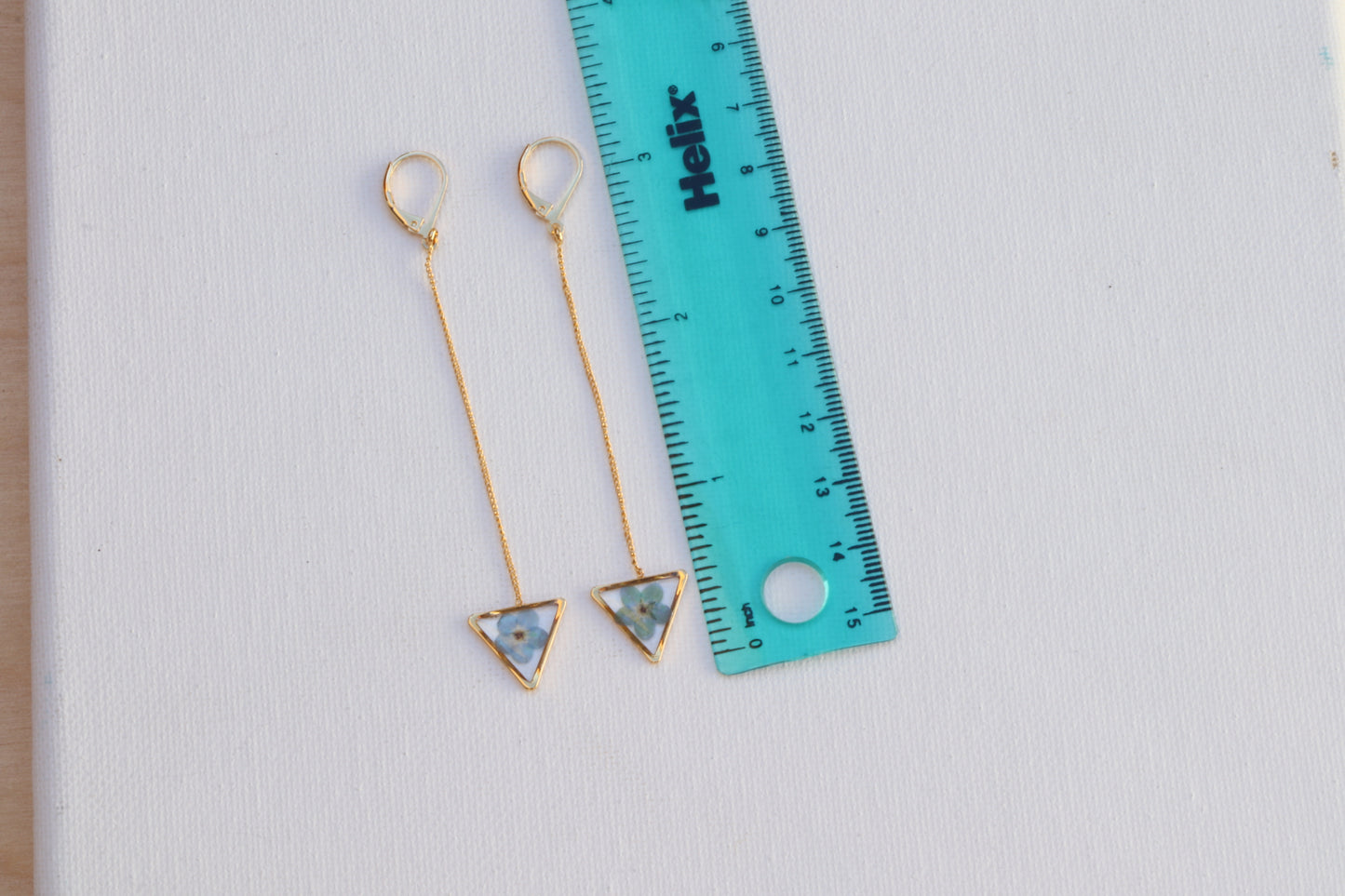 forget me not long drop triangle earrings