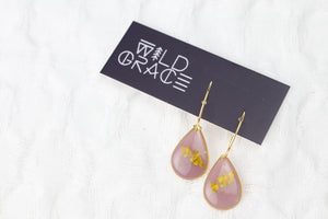 Gold Plated Hoops and Mixed Botanicals atop Pink Teardrop
